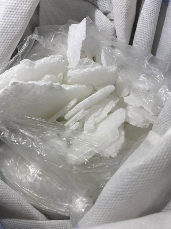 Serik'te motosiklet sepetinde 1 kiloya yakın uyuşturucu madde ele geçirildi